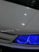 پژو پارس ELX سفید با چراغ‌های اسپرت آبی و رینگ مشکی